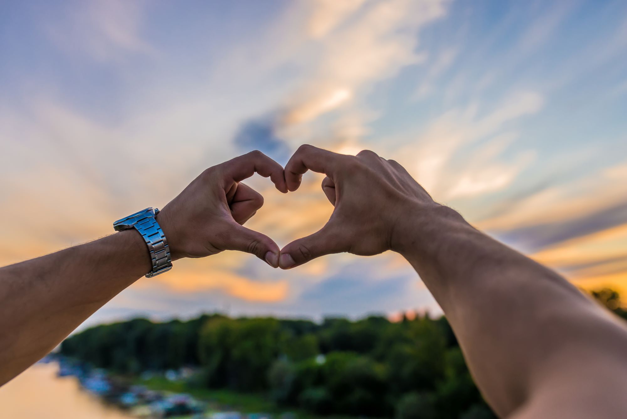 Hands forming a heart.